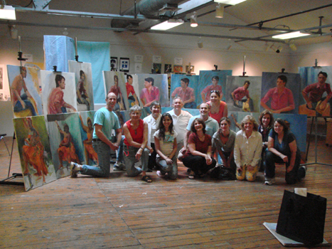 Luana and her students in a class photo.